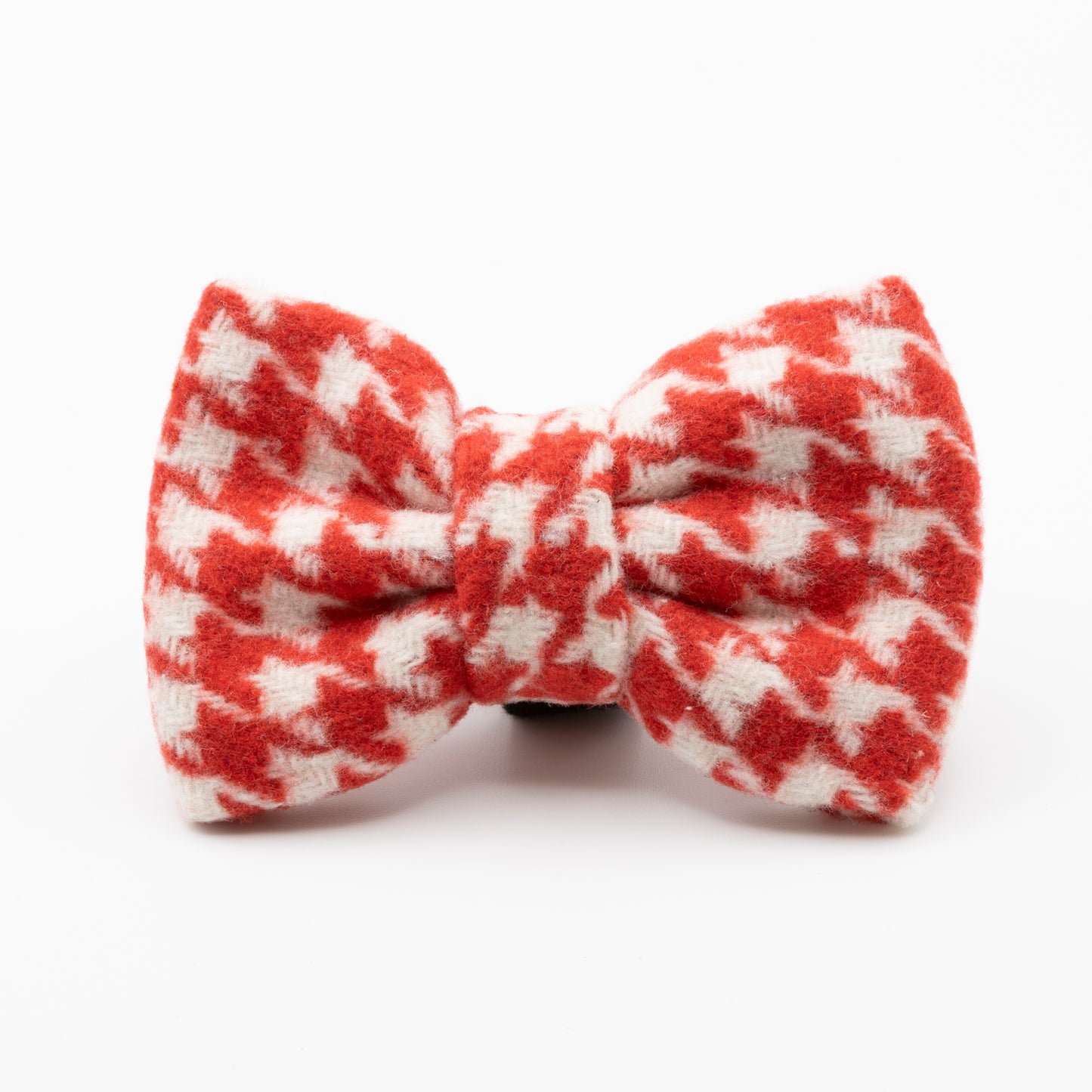 The Scarlet Houndstooth Dog Bow Tie, made from soft red and white tweed fabric, is shown against a plain white background.