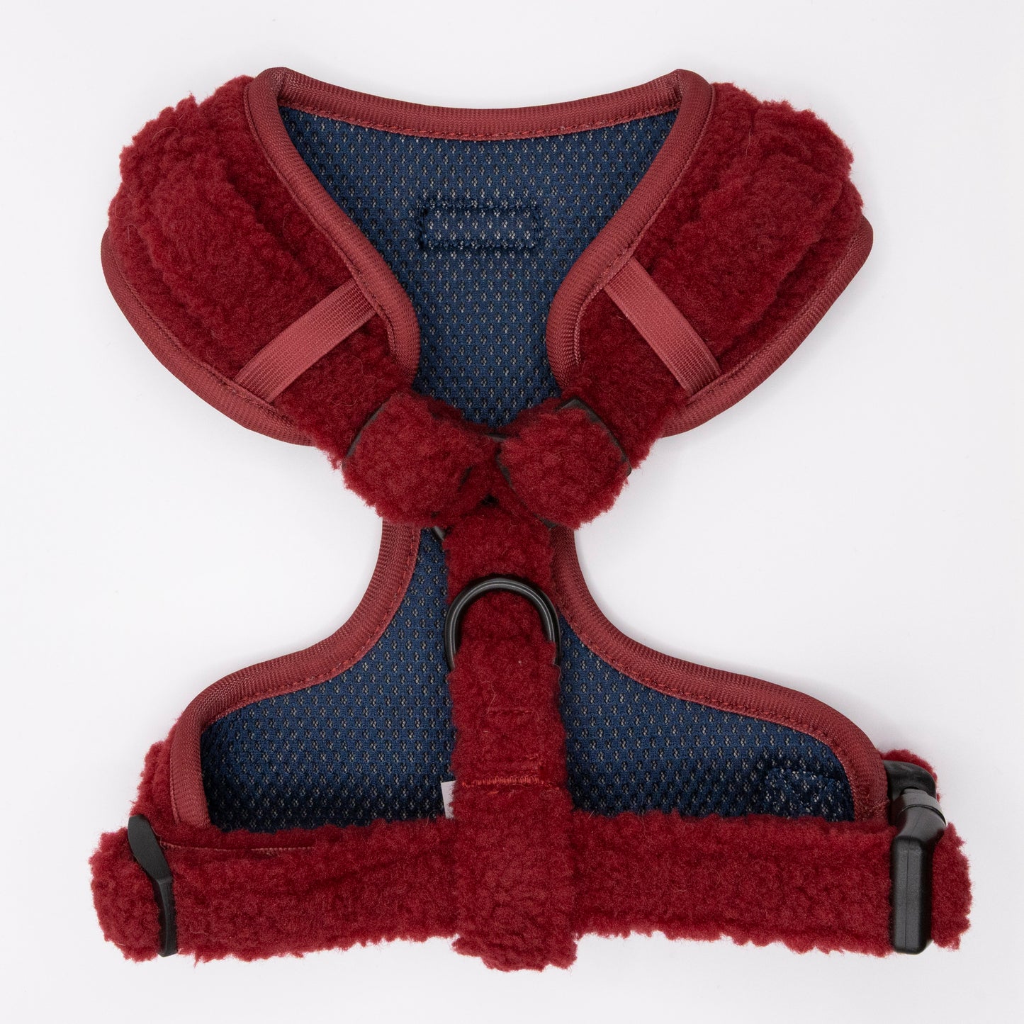 The Bordeaux Teddy Dog Harness features a red, fleece-lined adjustable fit with comfy straps, metal leash ring, and black plastic buckle. Displayed flat on a white background—ideal for small to medium dogs.