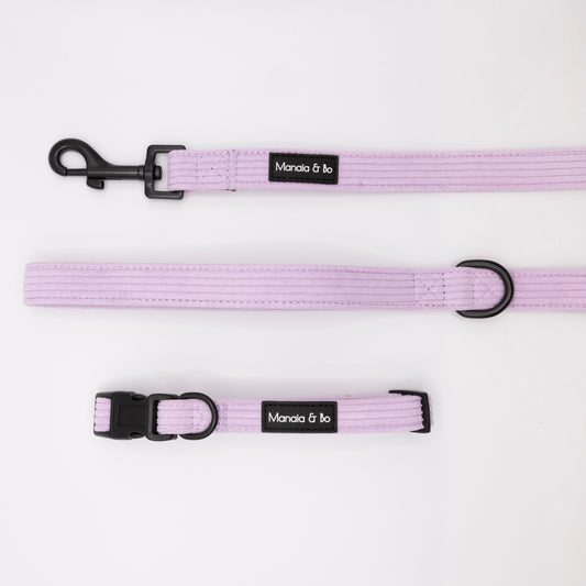 The Lavender Cord Collar & Lead set features a pastel purple adjustable collar and matching lead with black hardware and Mania & bo labels, shown on a white background.